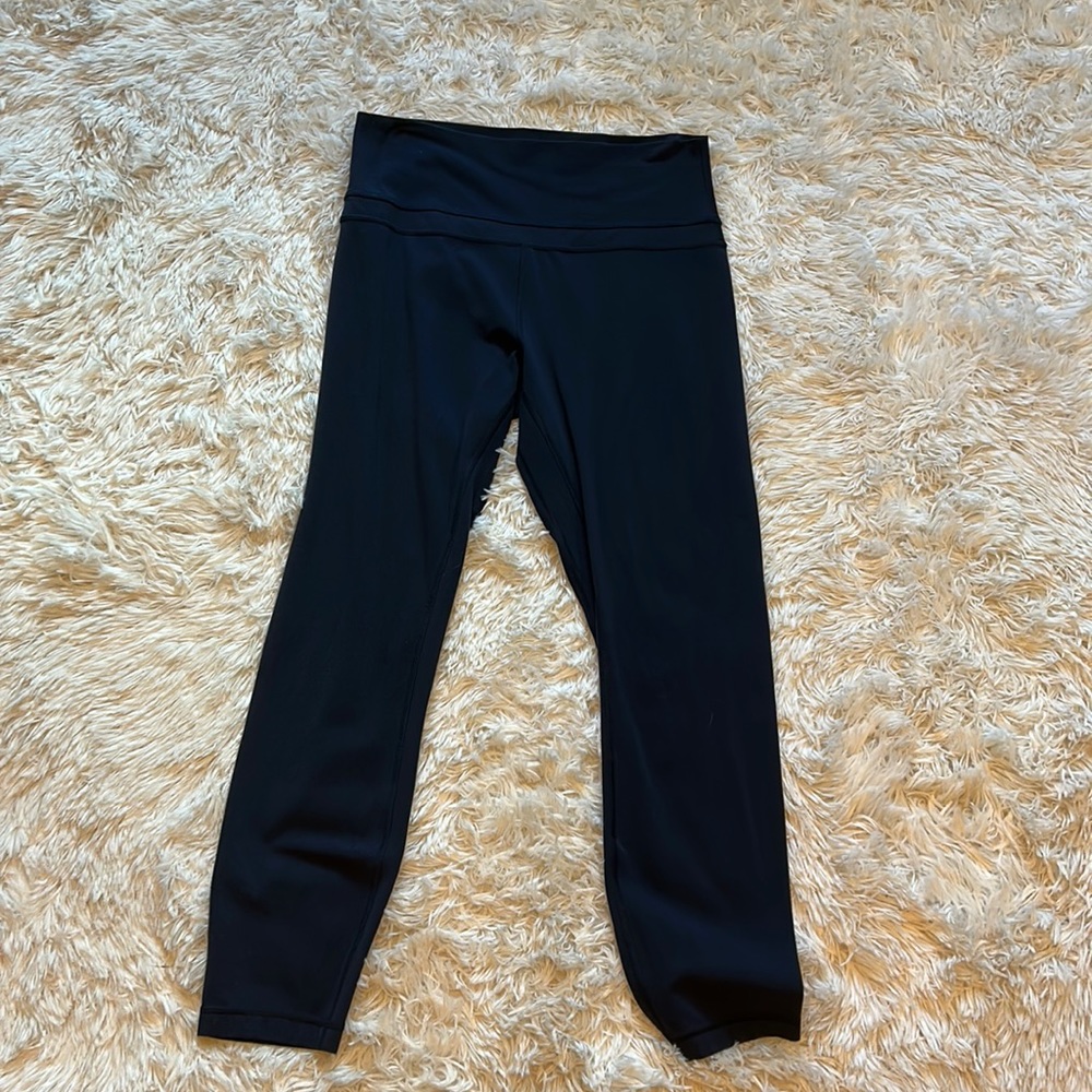 Lululemon leggings color is navy blue. The size is a 10